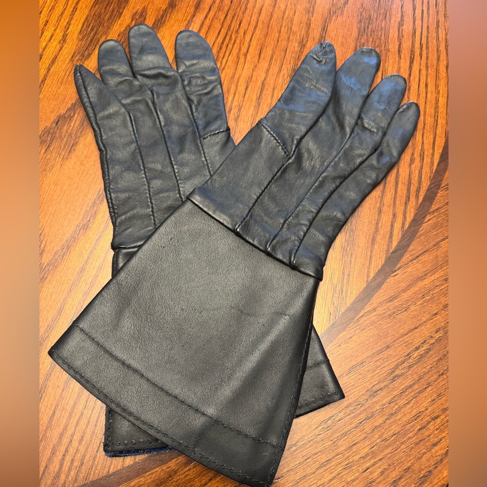 Black and blue leather gloves